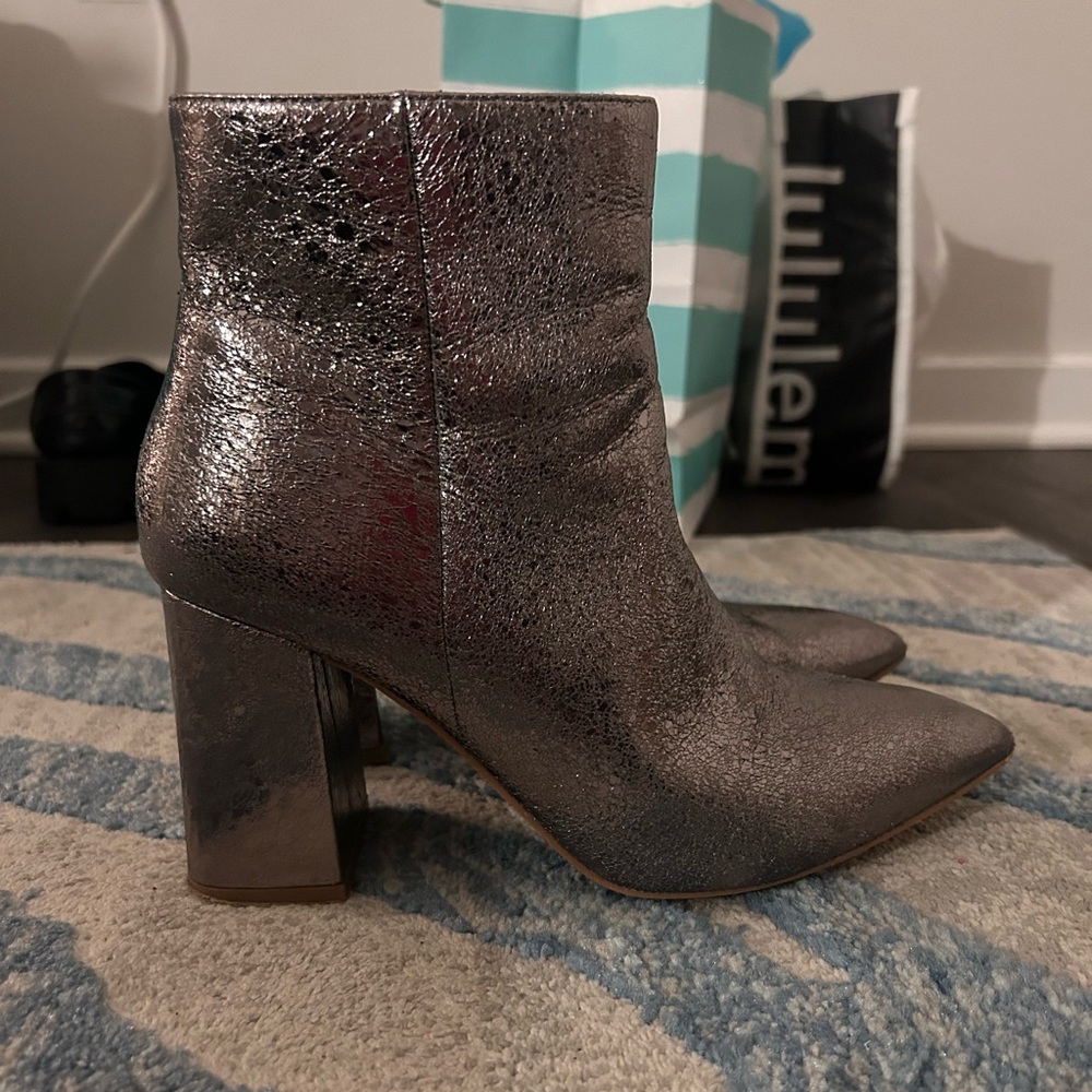 Shiny heeled boots
